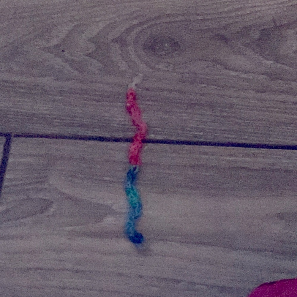 Colors are pink blue and red and handmade